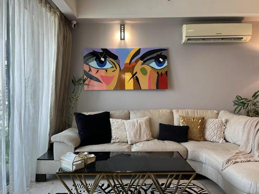 Two Faces shown in an interior, for a sense of scale